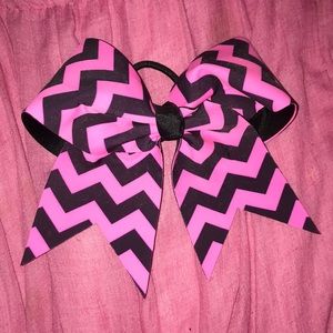 Pink and black striped cheer bow